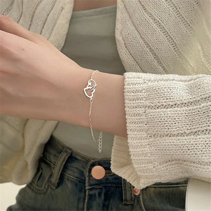Silver Double Interlocking Small Hearts Bracelet For Women